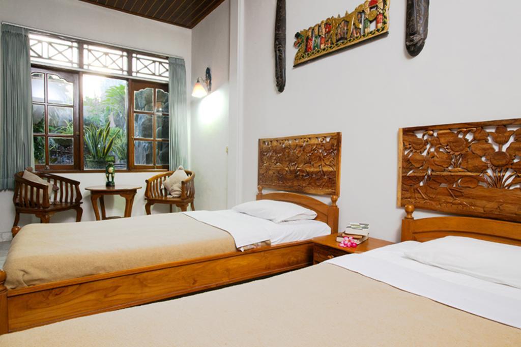Agung And Sue Watering Hole I Sanur Quarto foto